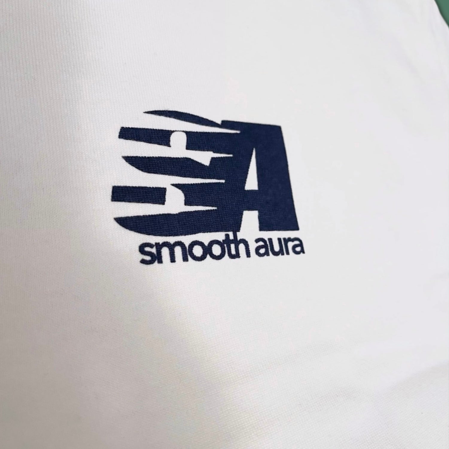 Vintage White "protect your aura." Tee